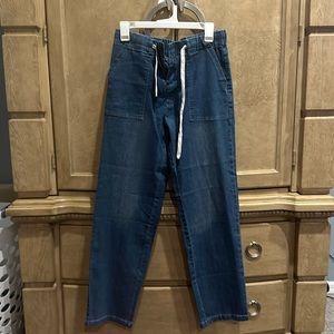 Blue jeans, new without tags, size medium tie closure.